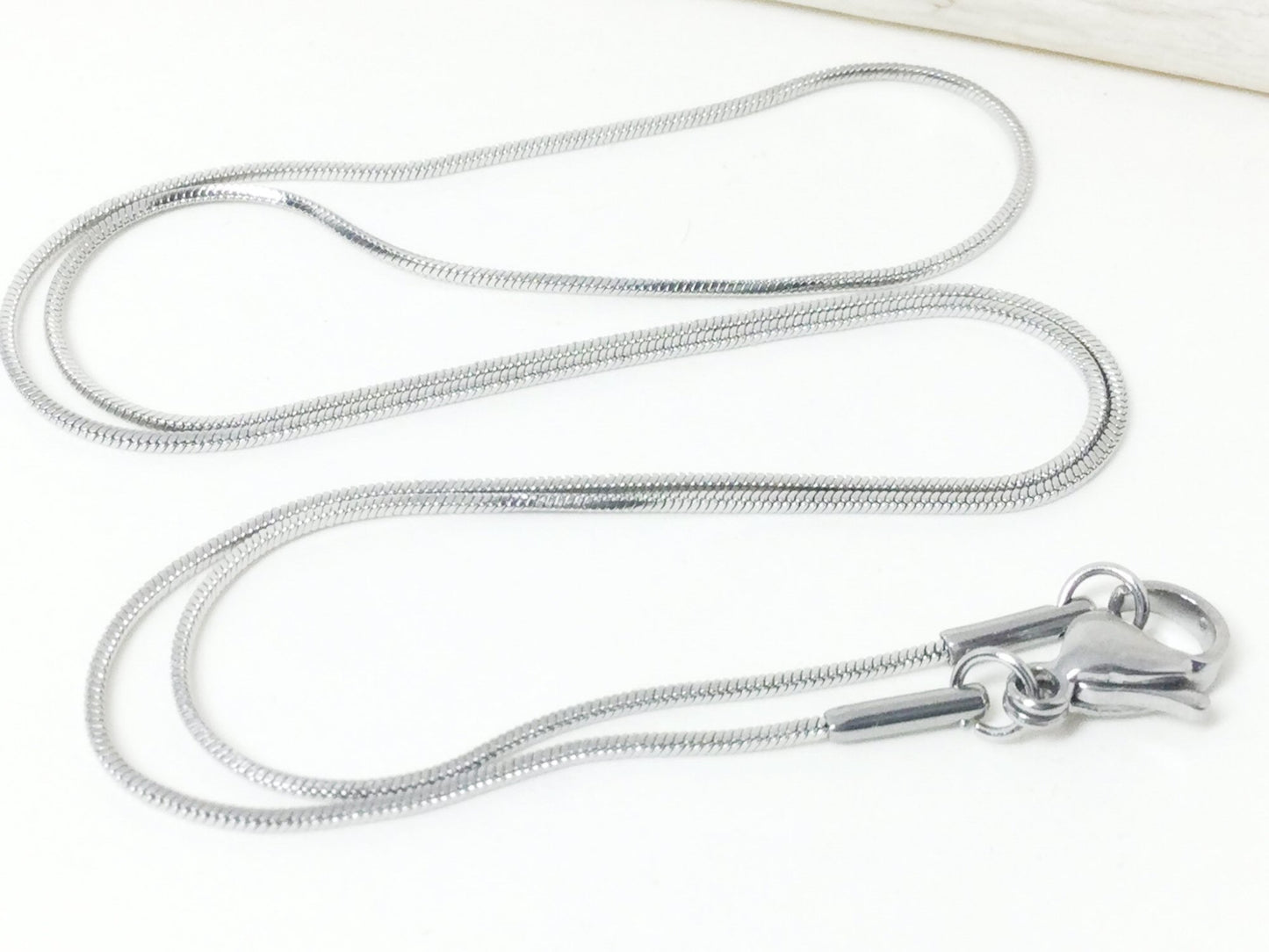 #2599 / 304 Polished Stainless Steel 1mm Snake 17.7” Necklace with a Lobster Claw Clasp / Sold Individually