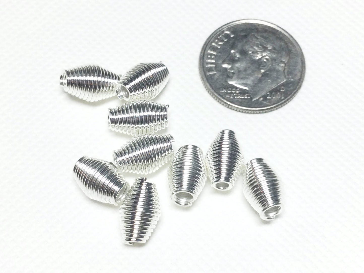 #2770 / Bright Silvertone Coil Spacer Beads or Earrings / 9x6mm / Lot of 10