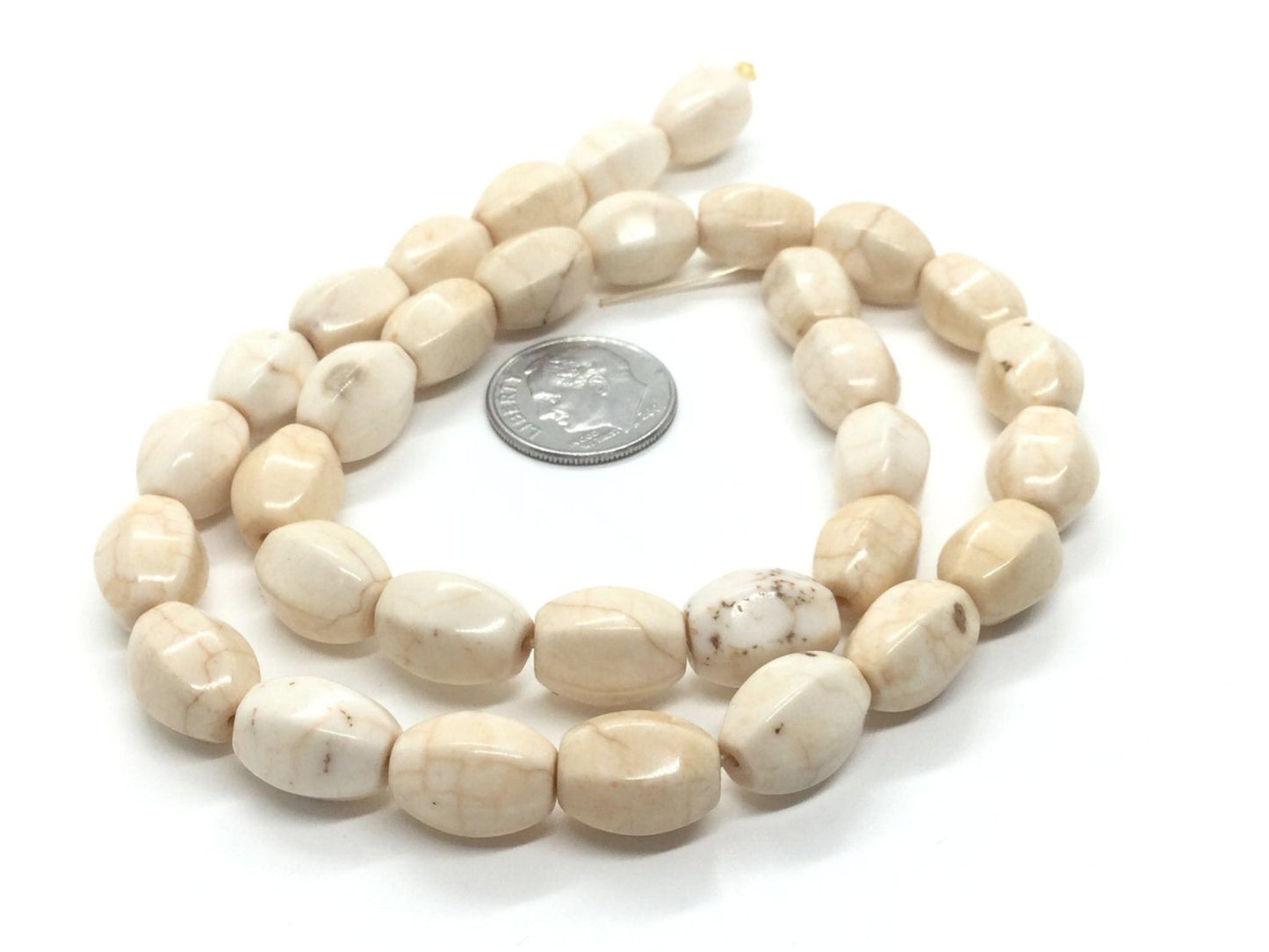 #2963 / Natural Creamy White Magnesite Faceted Oval Beads / 12x9mm / 1mm Hole / 7 3/4" Strand (16 Beads)
