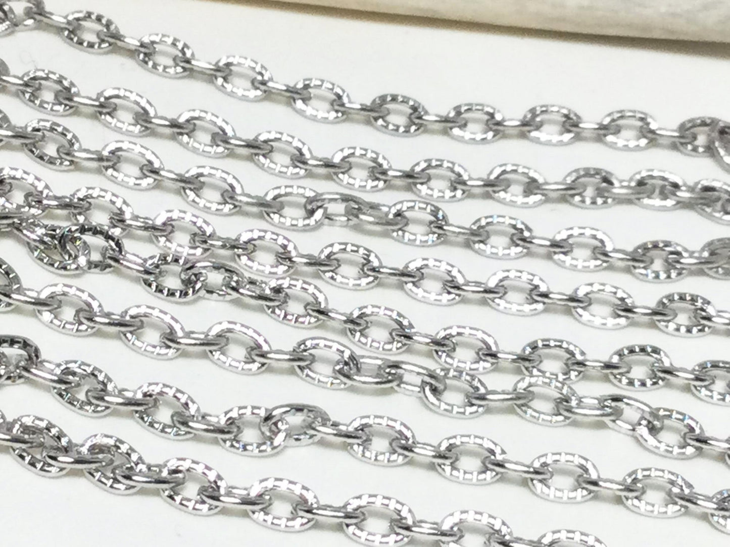 #2589 / Oval Platinum Colored Textured Iron Cable Chain Unwelded / 5x4x3.6mm / Sold by the Yard