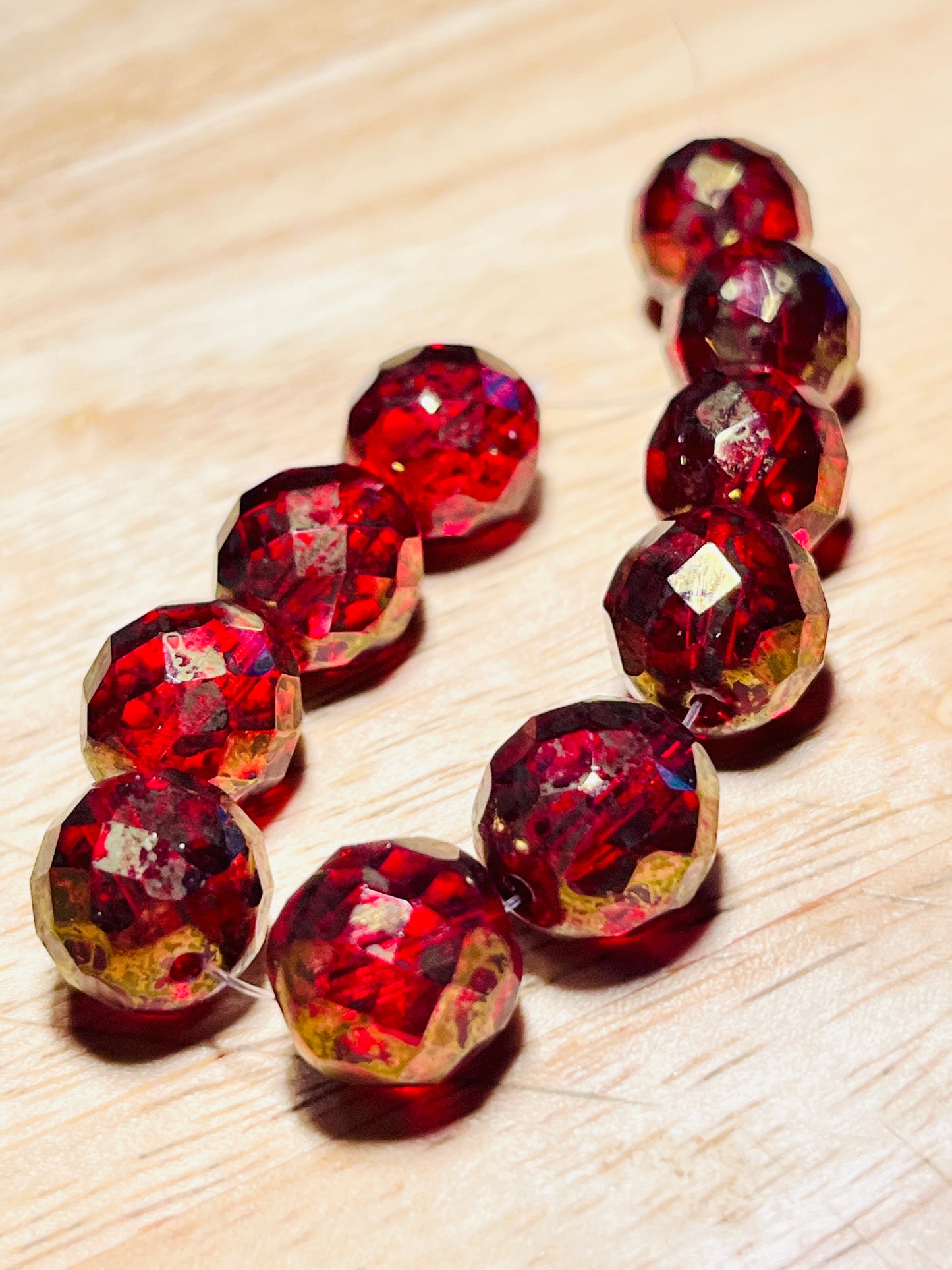 #2555 / Czech 12mm Faceted Translucent Ruby Red Round Beads with a Gold Dust Finish / 1mm Hole / Strand of 10