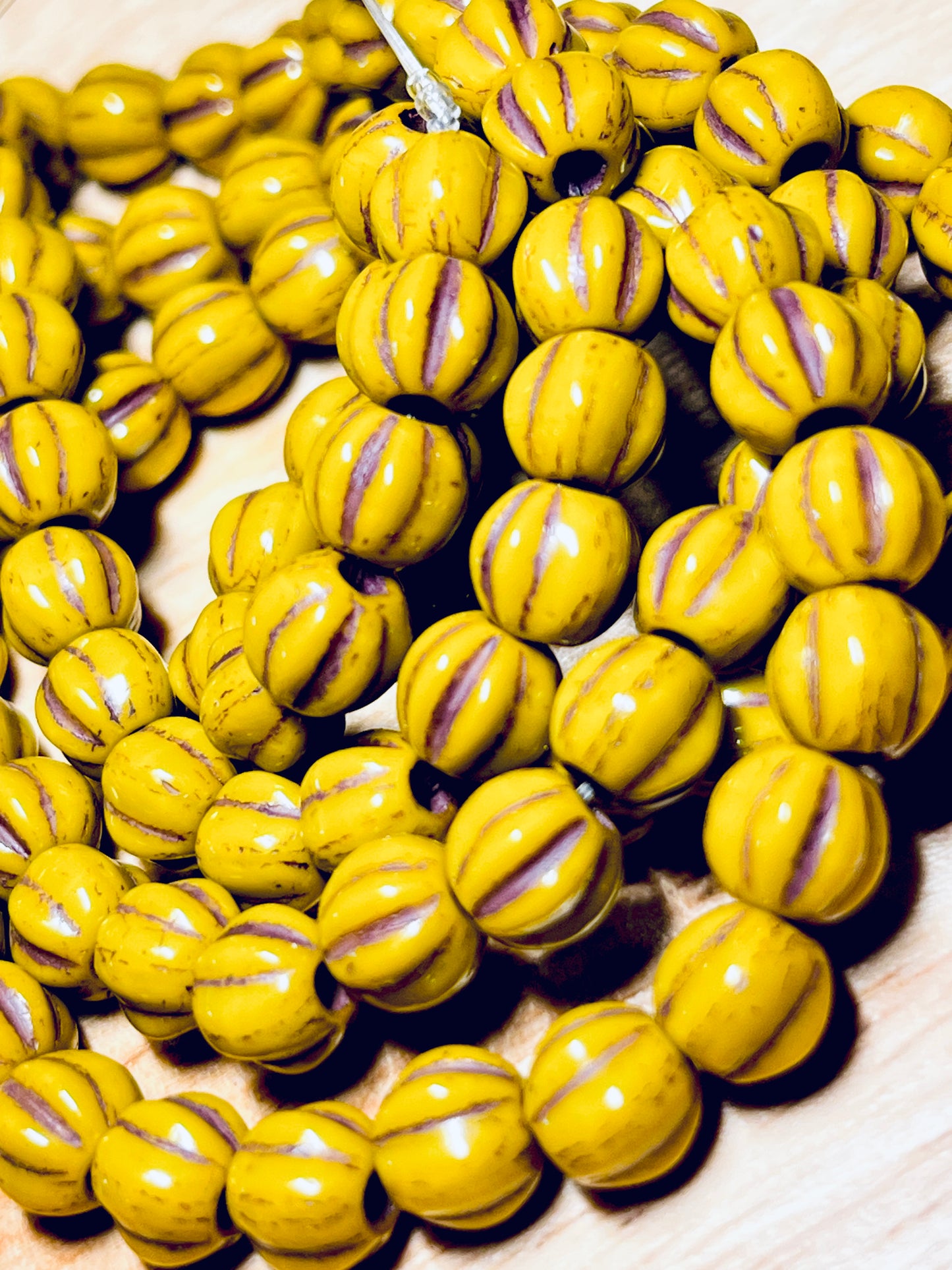 #2592 / Czech 6mm Large Hole Melon Beads / Yellow-Gold with a Brown Wash / Strand of 25