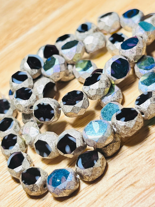 #2581 / Czech 8mm Table Cut Faceted Round Beads / A Blend of Opaque and White with a Color-shift AB Finish (applied to one side only) with an Antique Finish / 1mm Hole / Strand of 15