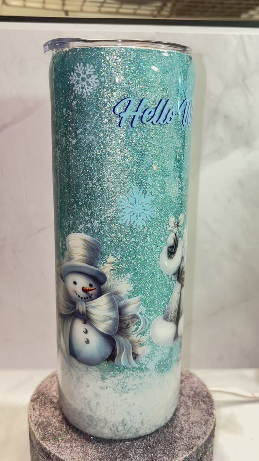 #413 - 20oz Skinny Tumbler / Winter Theme with Blue Glitter Base / Text "Hello Winter & "Let is Snow" / with Jolly Santa & Snowman Decals